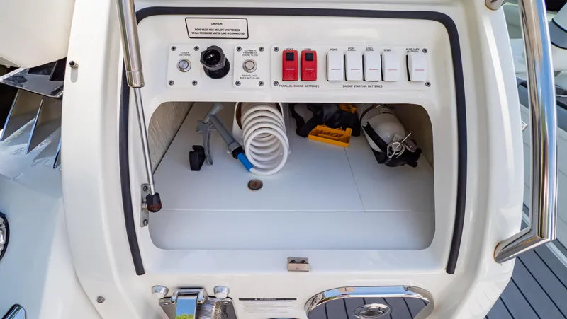  Yacht Photos Pics 2021 Formula 430 Super Sport Crossover control panel with switches and storage compartment.