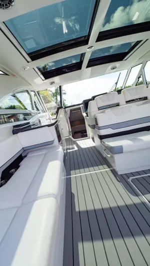  Yacht Photos Pics Luxurious interior of 2021 Formula 430 Super Sport Crossover with sleek seating and panoramic windows.