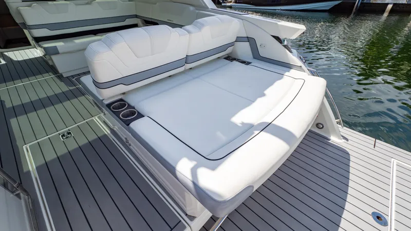  Yacht Photos Pics 2021 Formula 430 Super Sport Crossover boat with luxurious white seating on deck.