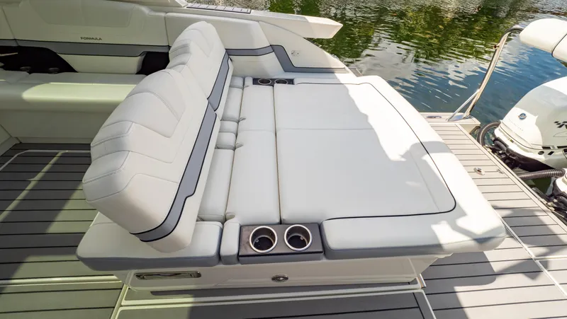  Yacht Photos Pics 2021 Formula 430 Super Sport Crossover boat with luxurious white seating and cup holders.