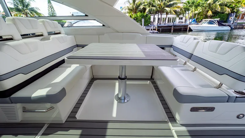  Yacht Photos Pics Luxurious interior of 2021 Formula 430 Super Sport Crossover yacht with elegant seating and table.