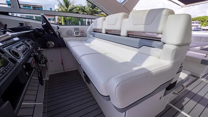  Yacht Photos Pics Interior of 2021 Formula 430 Super Sport Crossover with luxurious white seating.