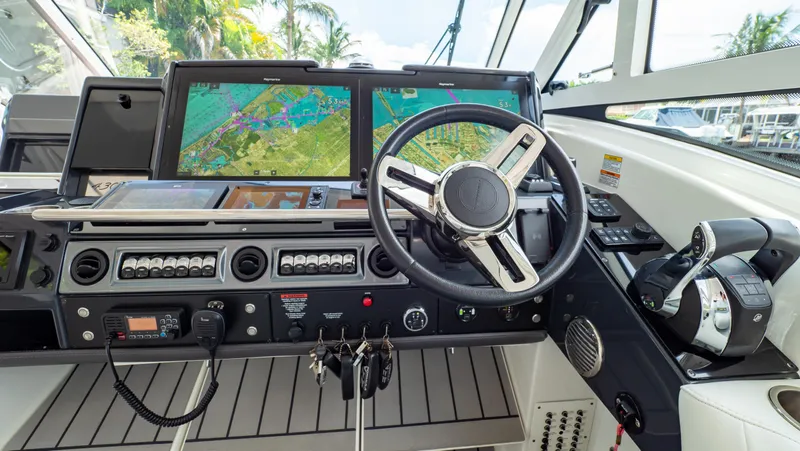  Yacht Photos Pics 2021 Formula 430 Super Sport Crossover helm with advanced navigation system and controls.