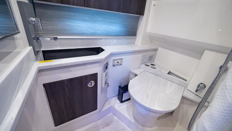  Yacht Photos Pics 2021 Formula 430 Super Sport Crossover bathroom with modern fixtures and sleek design.