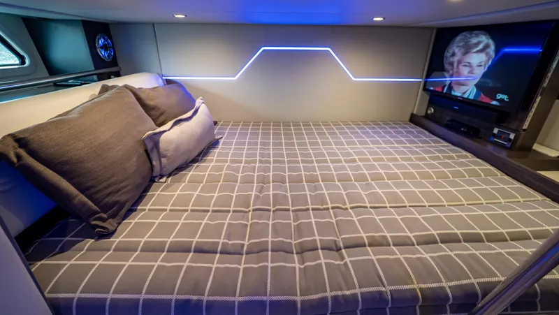  Yacht Photos Pics Luxurious cabin interior of 2021 Formula 430 Super Sport Crossover with bed and TV.