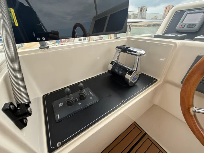  Yacht Photos Pics Control panel of 2011 Apreamare 65 MAESTRO yacht with throttle and joystick.