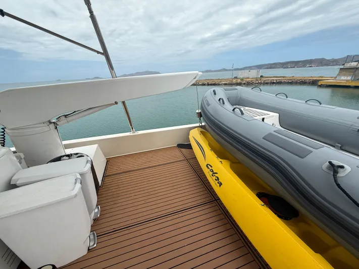  Yacht Photos Pics Apreamare 65 MAESTRO 2011 yacht deck with inflatable boat and sea view.