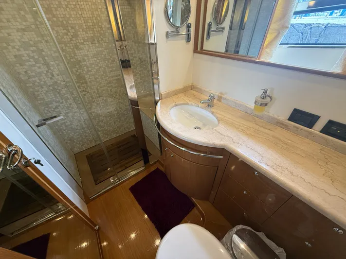  Yacht Photos Pics Luxurious bathroom in 2011 Apreamare 65 MAESTRO yacht with elegant fixtures and spacious shower.