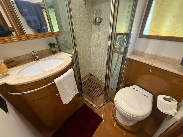  Yacht Photos Pics Luxurious bathroom on 2011 Apreamare 65 MAESTRO yacht with shower, sink, and toilet.