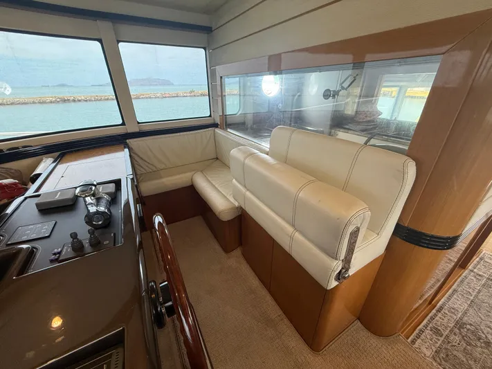  Yacht Photos Pics Interior of 2011 Apreamare 65 MAESTRO yacht with leather seating and panoramic windows.