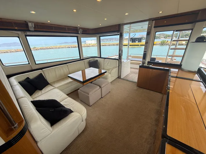  Yacht Photos Pics Luxurious interior of 2011 Apreamare 65 MAESTRO yacht with elegant seating and scenic views.