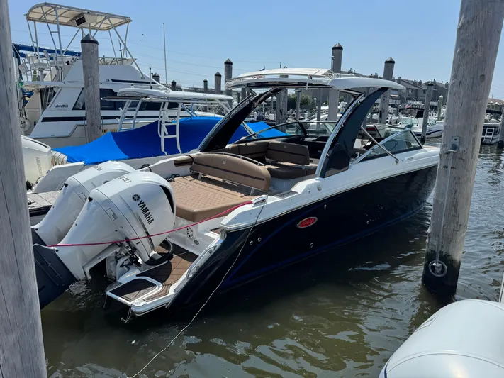  Yacht Photos Pics 2020 Cobalt 30SC Outboard boat docked with Yamaha engines.