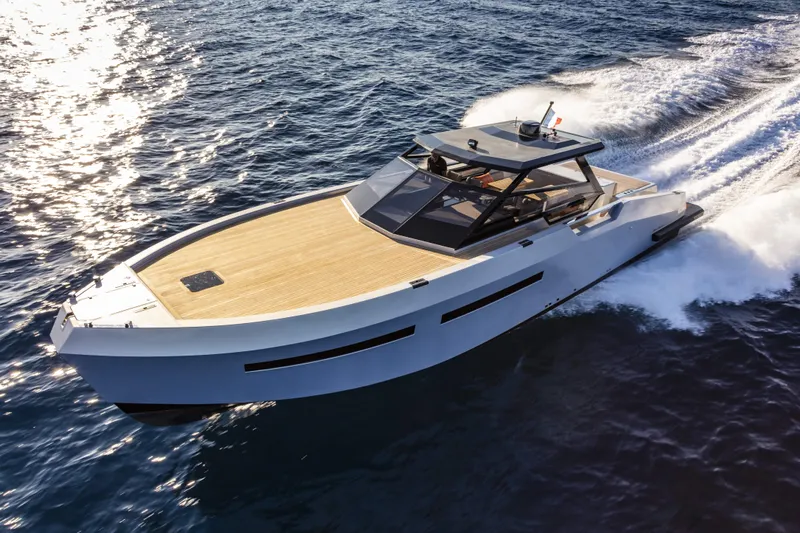  Yacht Photos Pics 2025 Mazu Yachts Mazu 52 cruising on open water, showcasing sleek design and luxury.