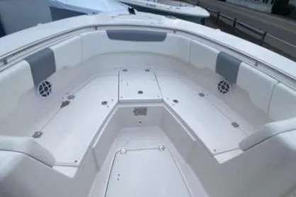 Yacht Photos Pics 2022 Robalo R302 Center Console boat interior with spacious seating and storage compartments.