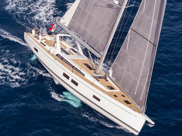  Yacht Photos Pics 2025 Grand Soleil 52 LC sailing yacht on open sea, aerial view.
