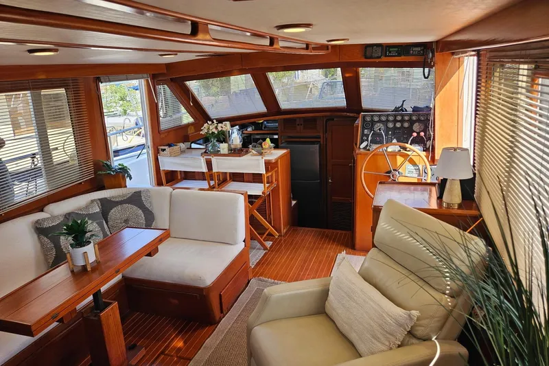 Southern Flite Yacht Photos Pics Luxurious interior of a 1990 Offshore Yachts 48 Yachtfisher with elegant seating and helm.