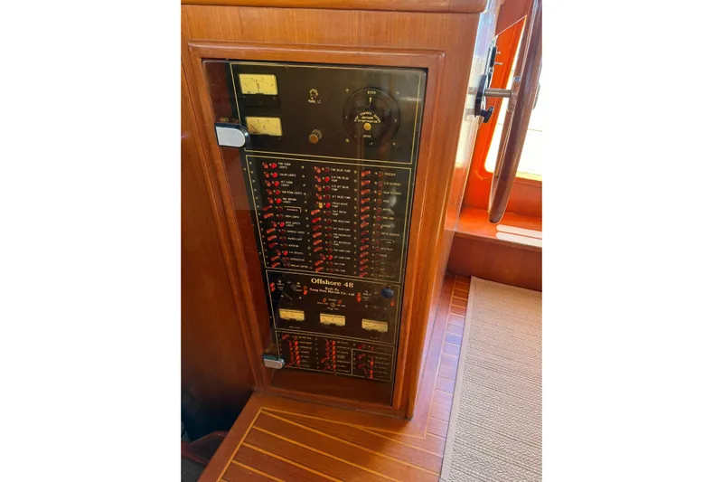 Southern Flite Yacht Photos Pics Electrical panel of 1990 Offshore Yachts 48 Yachtfisher, featuring switches and gauges.