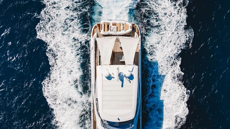 April Fools Yacht Photos Pics Azimut 80 Flybridge 2018 yacht cruising on open sea, aerial view.