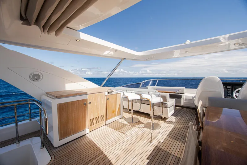 April Fools Yacht Photos Pics Luxurious 2018 Azimut 80 Flybridge yacht with elegant deck and ocean view.