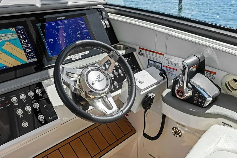 Maxsea Yacht Photos Pics 2022 Sea Ray Sundancer 320 Outboard helm with advanced navigation displays and controls.