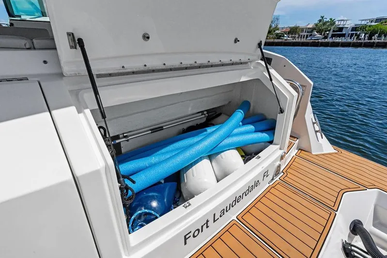 Maxsea Yacht Photos Pics 2022 Sea Ray Sundancer 320 Outboard storage with pool noodles, docked in Fort Lauderdale.