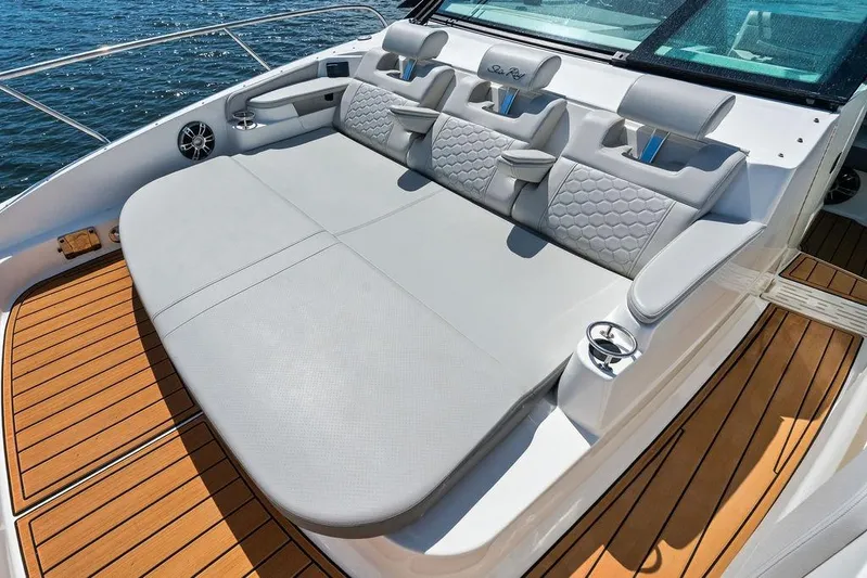 Maxsea Yacht Photos Pics Luxurious seating on 2022 Sea Ray Sundancer 320 Outboard, featuring elegant design and comfort.