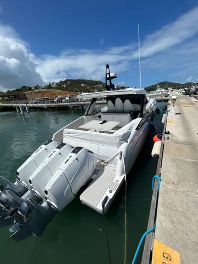 No Name Yacht Photos Pics 2024 Azimut Verve 48 luxury yacht docked at marina, featuring powerful outboard engines.