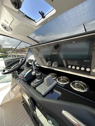 No Name Yacht Photos Pics 2024 Azimut Verve 48 helm with advanced navigation controls and sleek dashboard design.