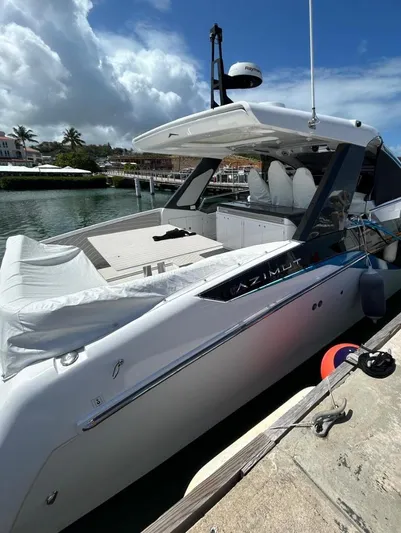 No Name Yacht Photos Pics 2024 Azimut Verve 48 luxury yacht docked at marina under blue sky.