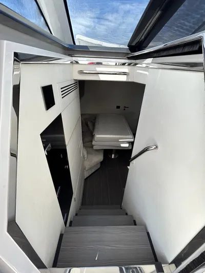 No Name Yacht Photos Pics 2024 Azimut Verve 48 interior with modern design and sleek staircase.