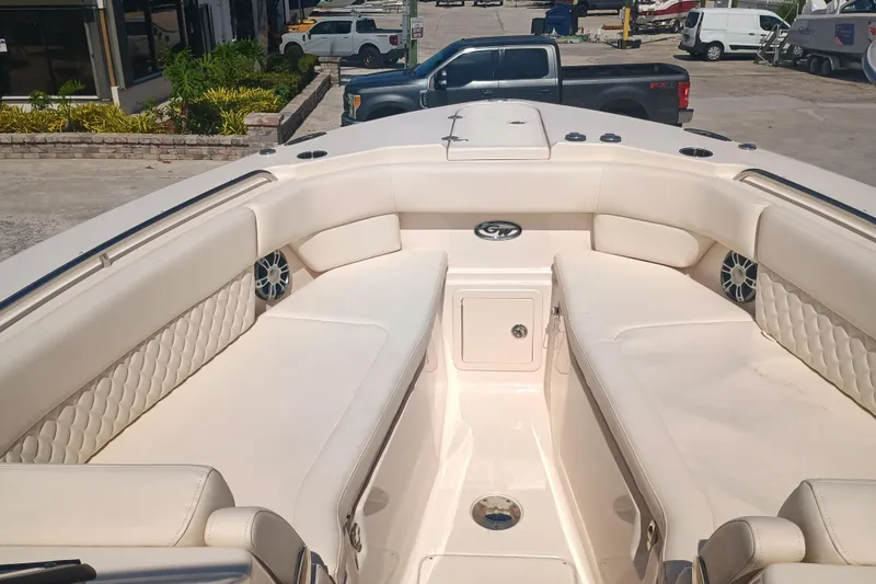 307-310 Yacht Photos Pics 2025 Grady-White Freedom 307 boat interior with luxurious seating and modern design.