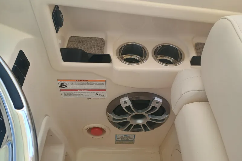 307-310 Yacht Photos Pics Interior of 2025 Grady-White Freedom 307 boat with cup holders and speaker.