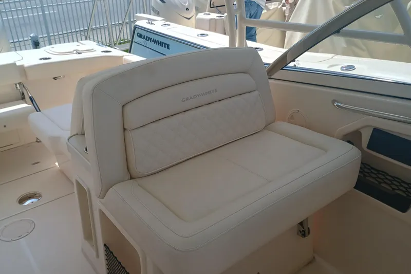 307-310 Yacht Photos Pics 2025 Grady-White Freedom 307 boat interior with luxurious seating and elegant design.