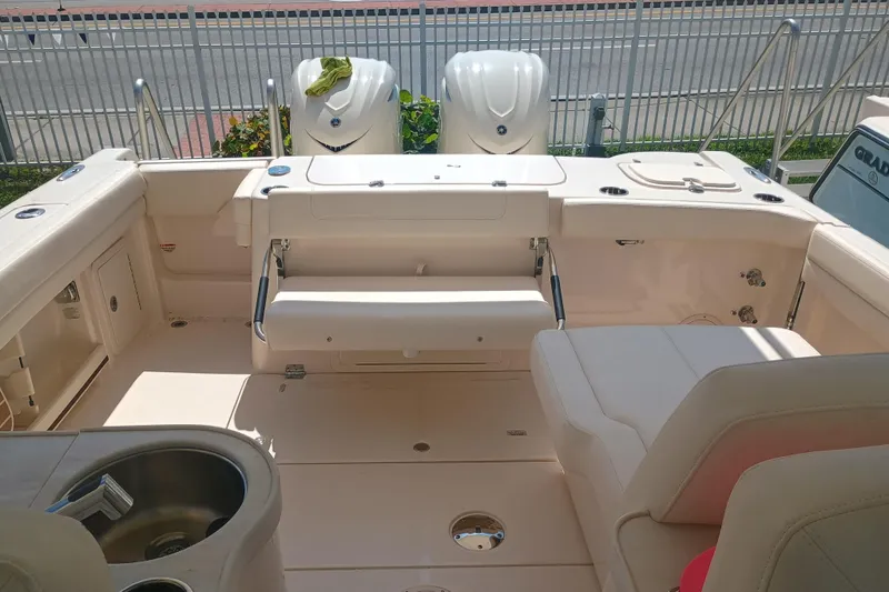 307-310 Yacht Photos Pics 2025 Grady-White Freedom 307 boat interior with seating and storage features.