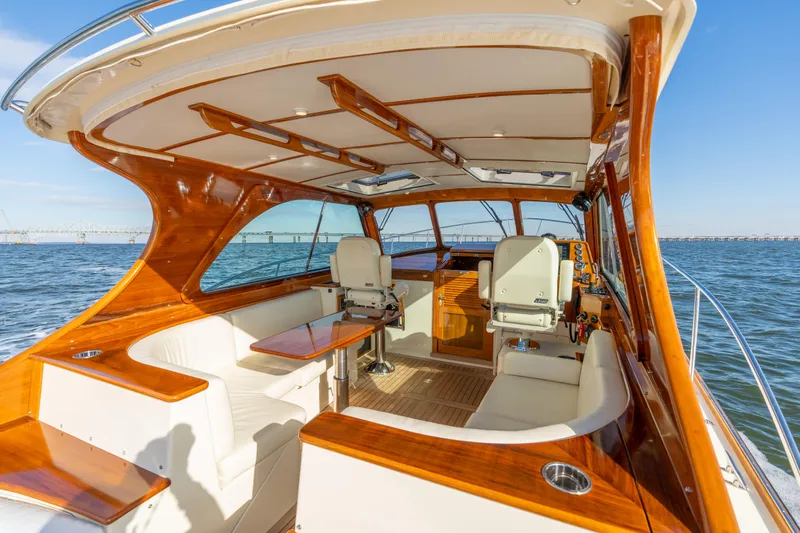 Upshort Yacht Photos Pics Luxurious 2010 Hinckley Talaria 44 MKII Express yacht interior with elegant wood finish.