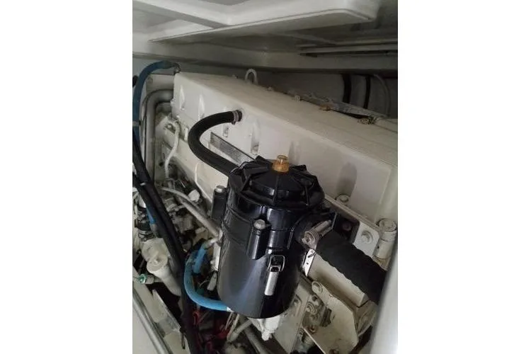  Yacht Photos Pics Engine compartment of 2005 Luhrs 41 Convertible boat, featuring detailed mechanical components.