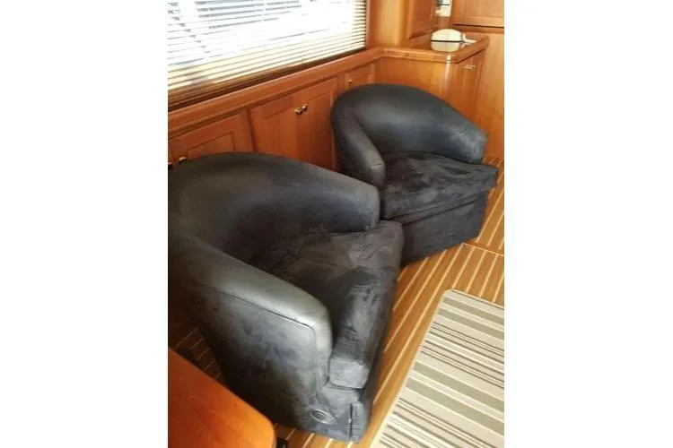  Yacht Photos Pics Luxurious seating in 2005 Luhrs 41 Convertible yacht interior.