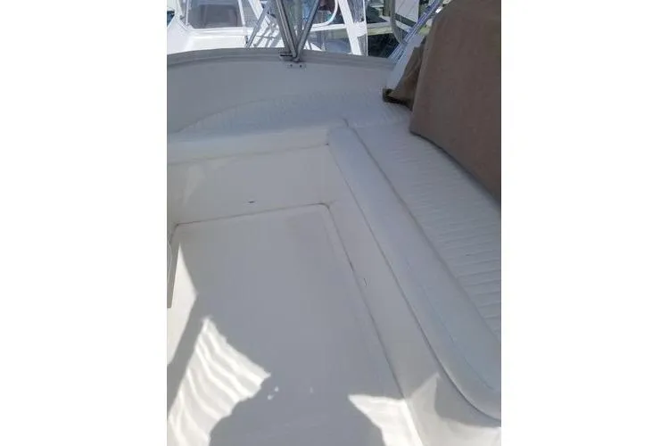  Yacht Photos Pics 2005 Luhrs 41 Convertible boat interior with seating and deck area.