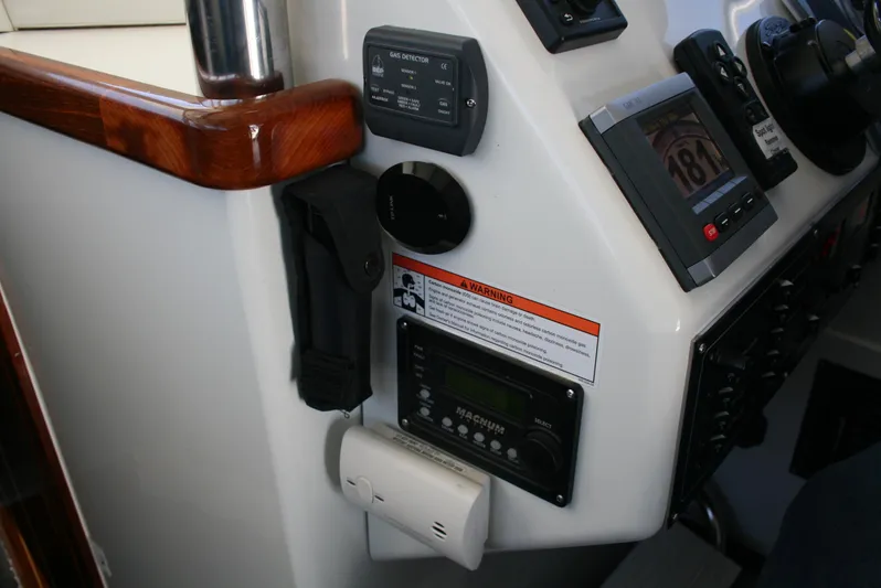 Gypsy Spirit Yacht Photos Pics Control panel of a 2011 Ocean Sport Roamer 30' boat with navigation instruments.