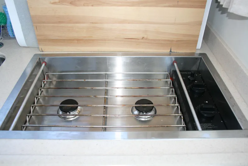 Gypsy Spirit Yacht Photos Pics Stainless steel stove in 2011 Ocean Sport Roamer 30' boat kitchen.