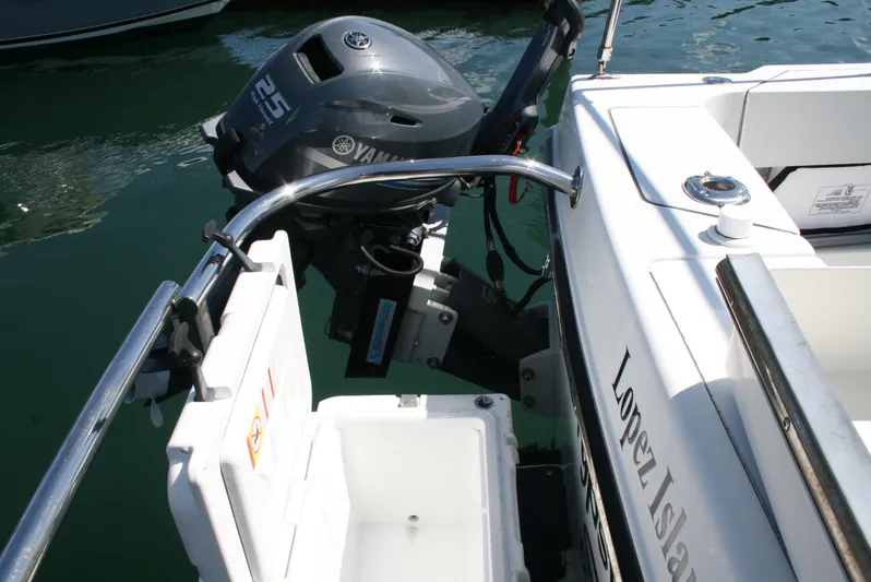 Gypsy Spirit Yacht Photos Pics Ocean Sport Roamer 30' boat with Yamaha outboard motor, 2011 model, docked at Lopez Island.