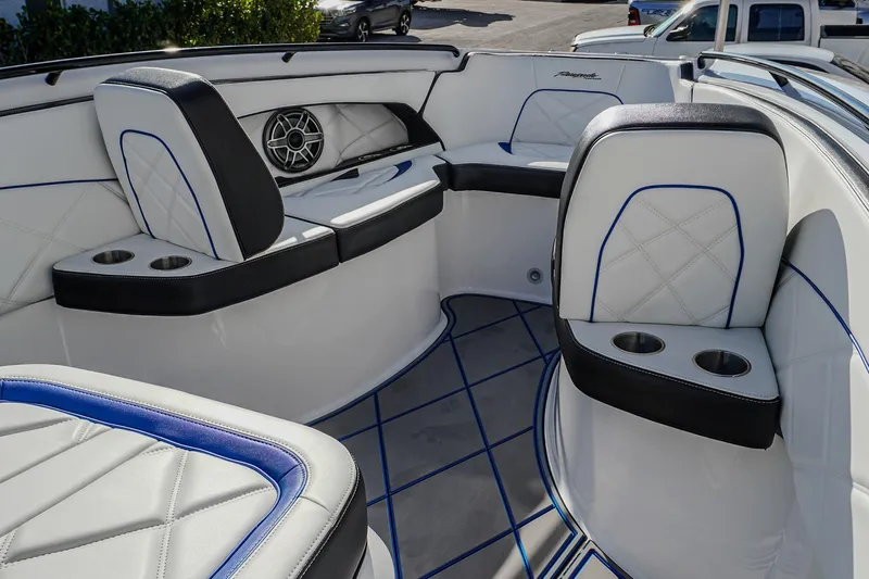  Yacht Photos Pics 2024 Renegade 38 Open boat interior with luxurious seating and cup holders.
