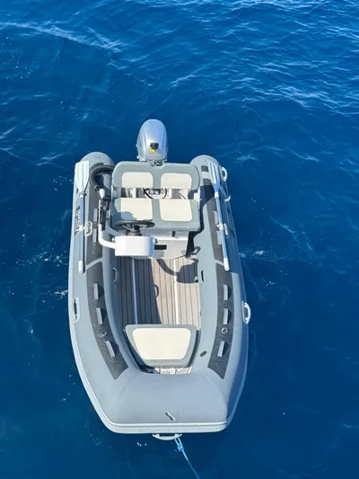  Yacht Photos Pics Inflatable boat on blue water, Lagoon 46 model, 2025.