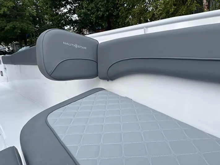  Yacht Photos Pics 2025 NauticStar 292 Legacy boat interior with gray cushioned seating.