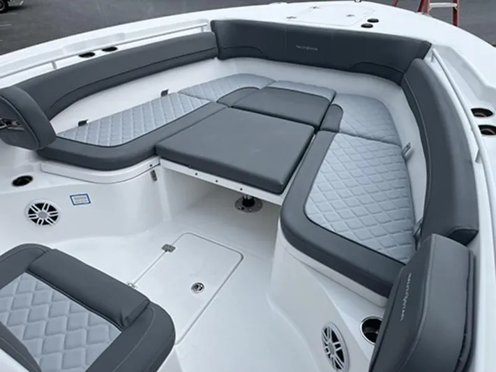  Yacht Photos Pics 2025 NauticStar 292 Legacy boat interior with cushioned seating and modern design.
