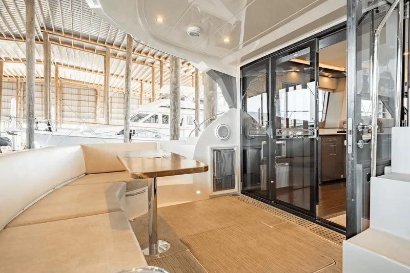Telesto Yacht Photos Pics Luxurious 2017 Carver 52 Command Bridge yacht interior with elegant seating and modern kitchen.