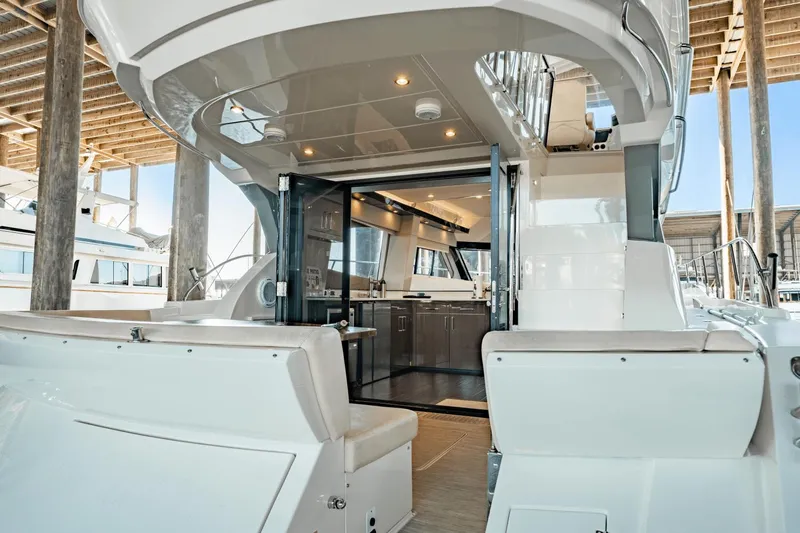 Telesto Yacht Photos Pics 2017 Carver 52 Command Bridge yacht with open deck and luxurious interior.