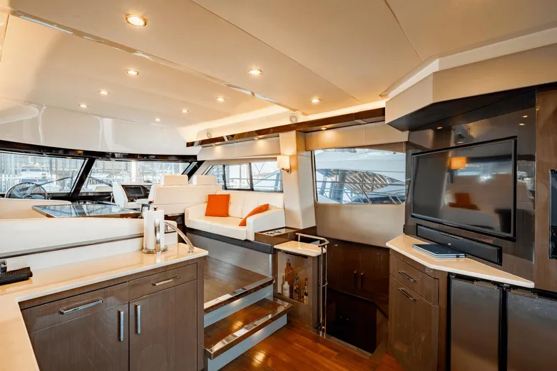 Telesto Yacht Photos Pics Luxurious interior of 2017 Carver 52 Command Bridge yacht with modern amenities.