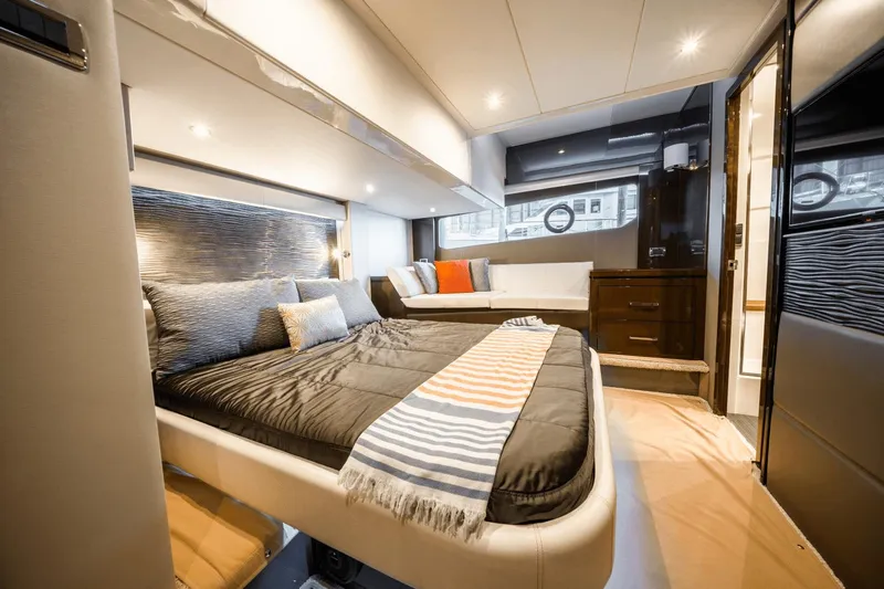 Telesto Yacht Photos Pics Luxurious interior of 2017 Carver 52 Command Bridge yacht with elegant bedroom design.