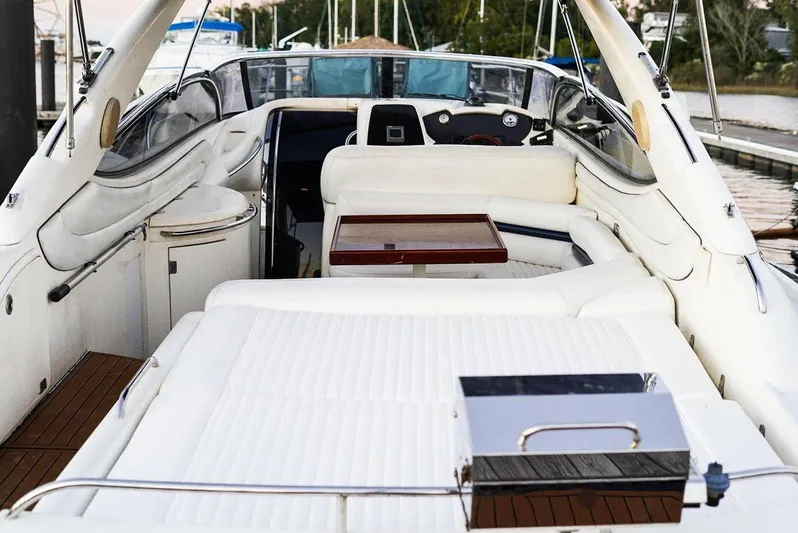  Yacht Photos Pics Sunseeker Superhawk 48 Mk II 2000 yacht interior with white seating and wooden accents.